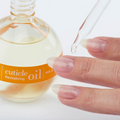 Cuccio Naturalé Cuticle Oil On Hand